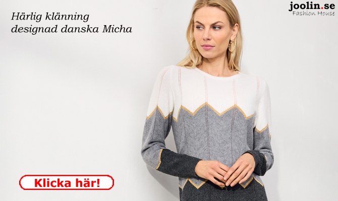 Fint mnsterstickad klnning i grddvit/antracit