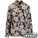Underbart vacker blus med svart bottenfrg