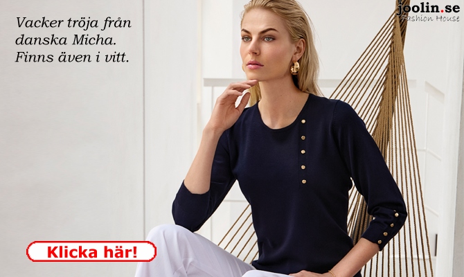 Stilren trja med fina guldfrgade knappar